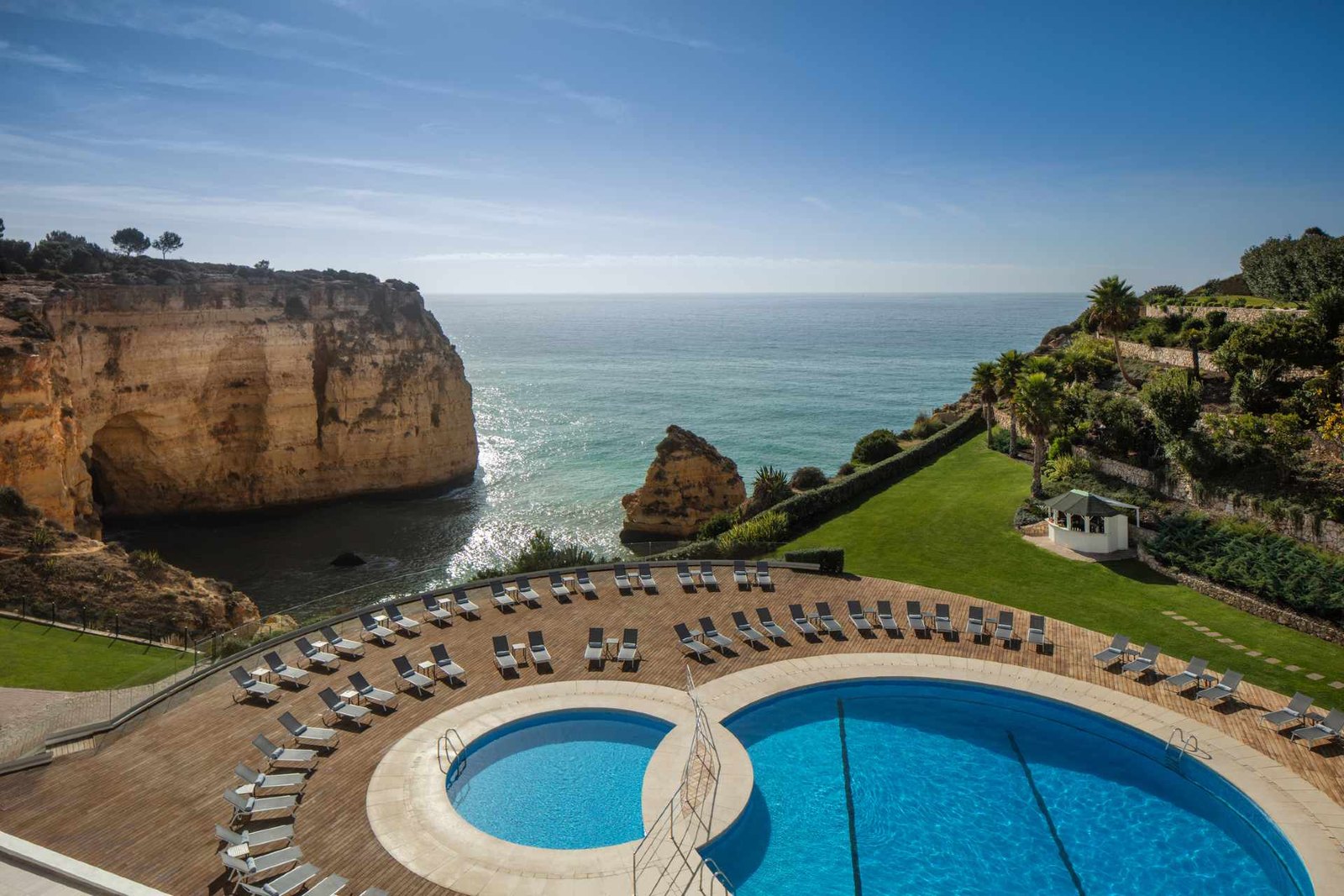 Pools on the cliff top above the sea and the ochre rocks, Tivoli Carvoeiro Pools on the cliff top above the sea and the ochre rocks, Tivoli Carvoeiro