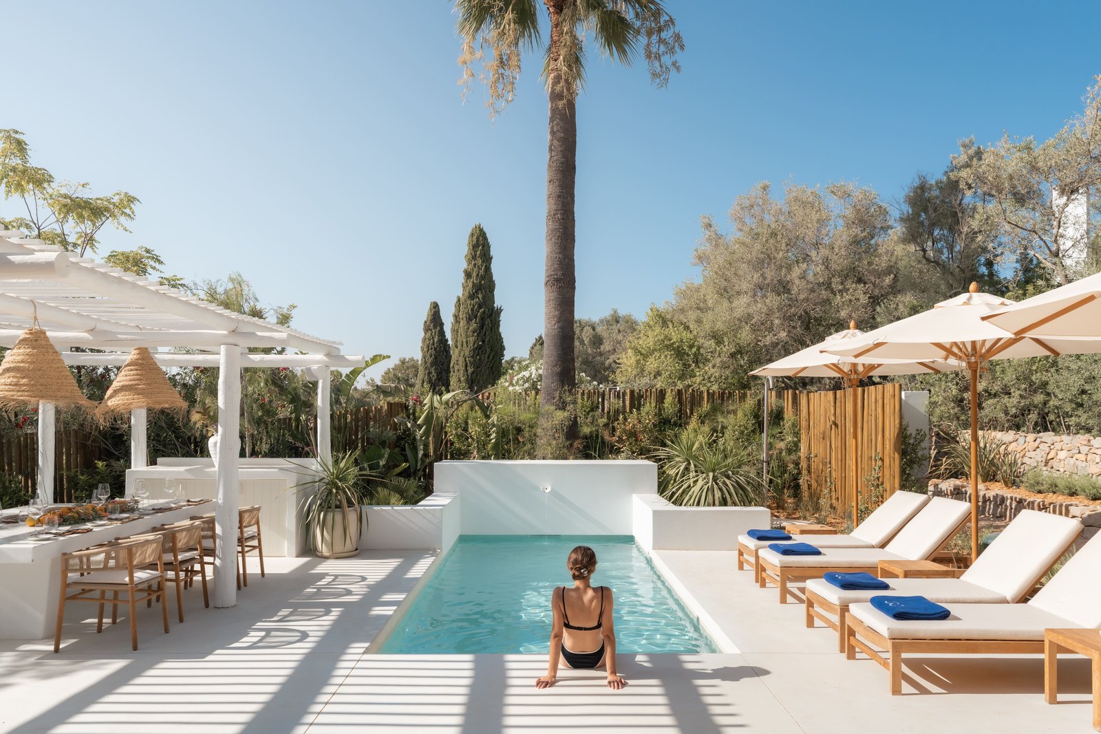Private villa pool with white loungers and a palm tree, Octant Vila Monte, Moncarapacho Private villa pool with white loungers and a palm tree, Octant Vila Monte, Moncarapacho