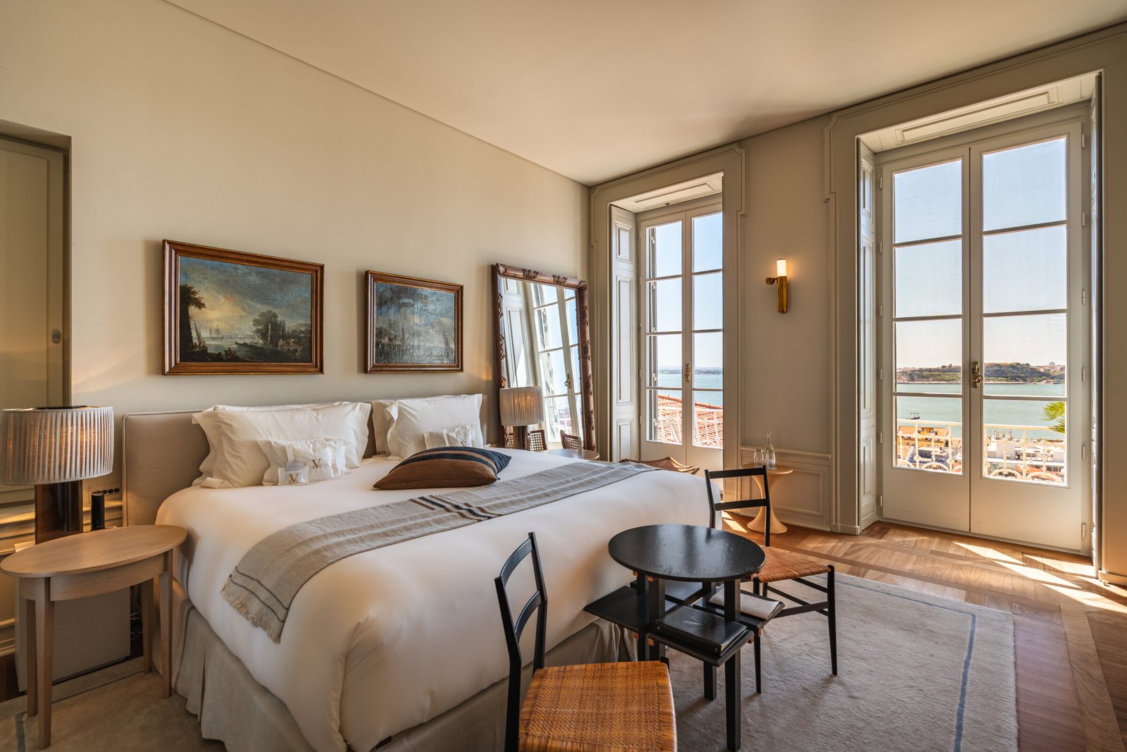 Royal Suite bedroom with tall French windows looking towards the river, Verride Palácio Santa Catarina, Lisbon Royal Suite bedroom with tall French windows looking towards the river, Verride Palácio Santa Catarina, Lisbon