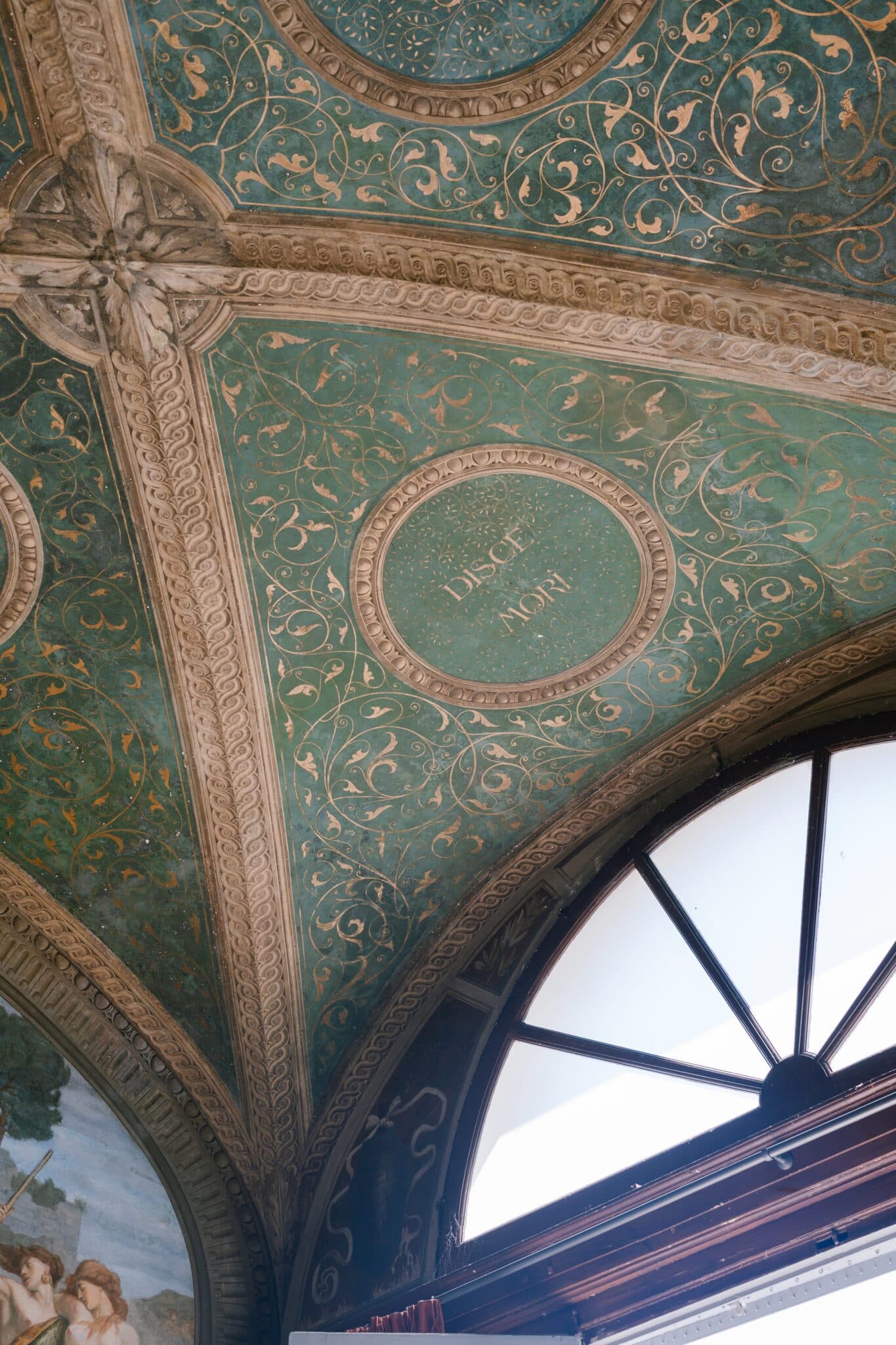 Ornate painted ceiling with gold details inside Villa Carlotta, Lake Como.
