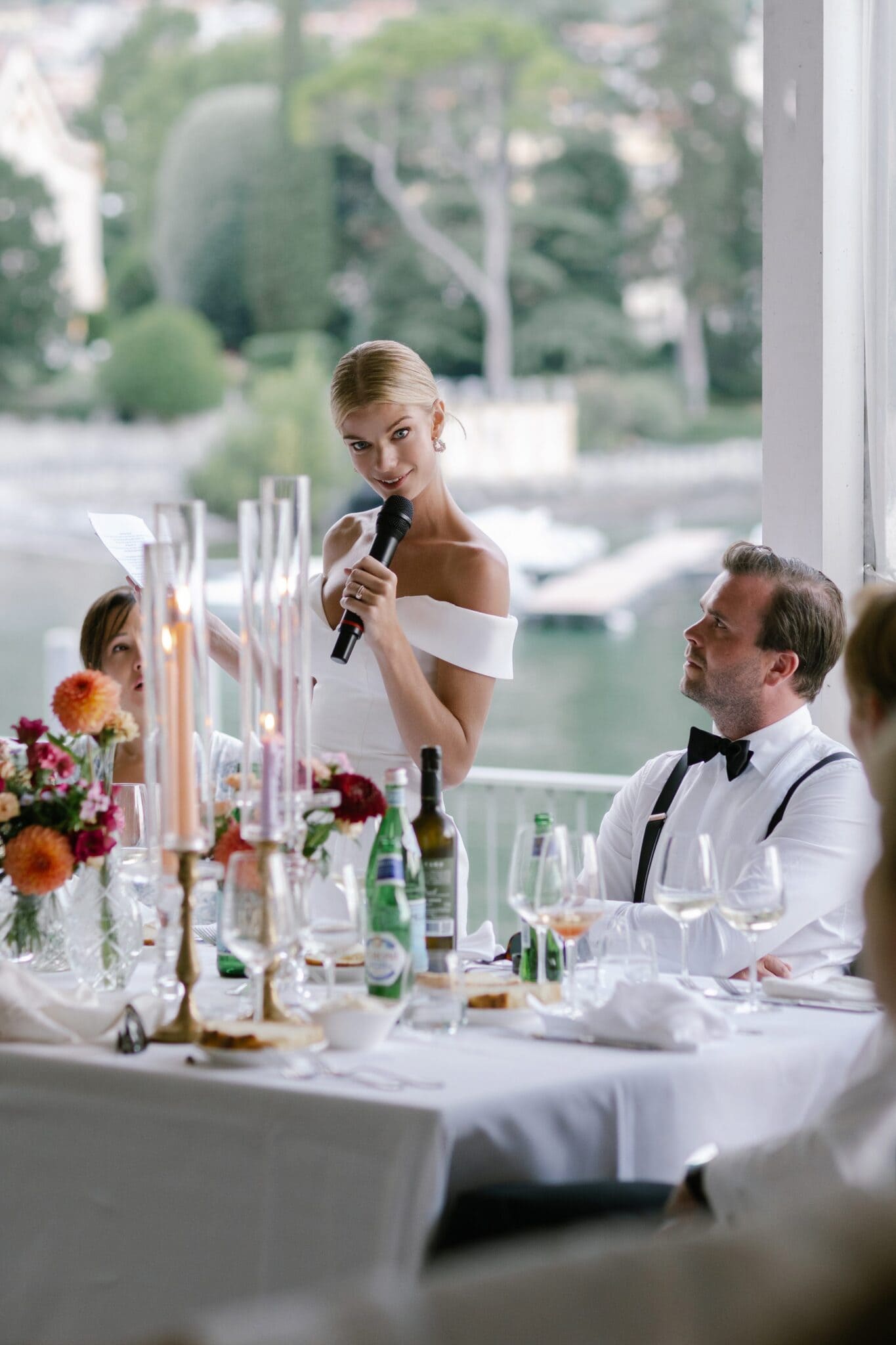 Bride giving her wedding speech during the reception at Lido di Lenno on Lake Como.