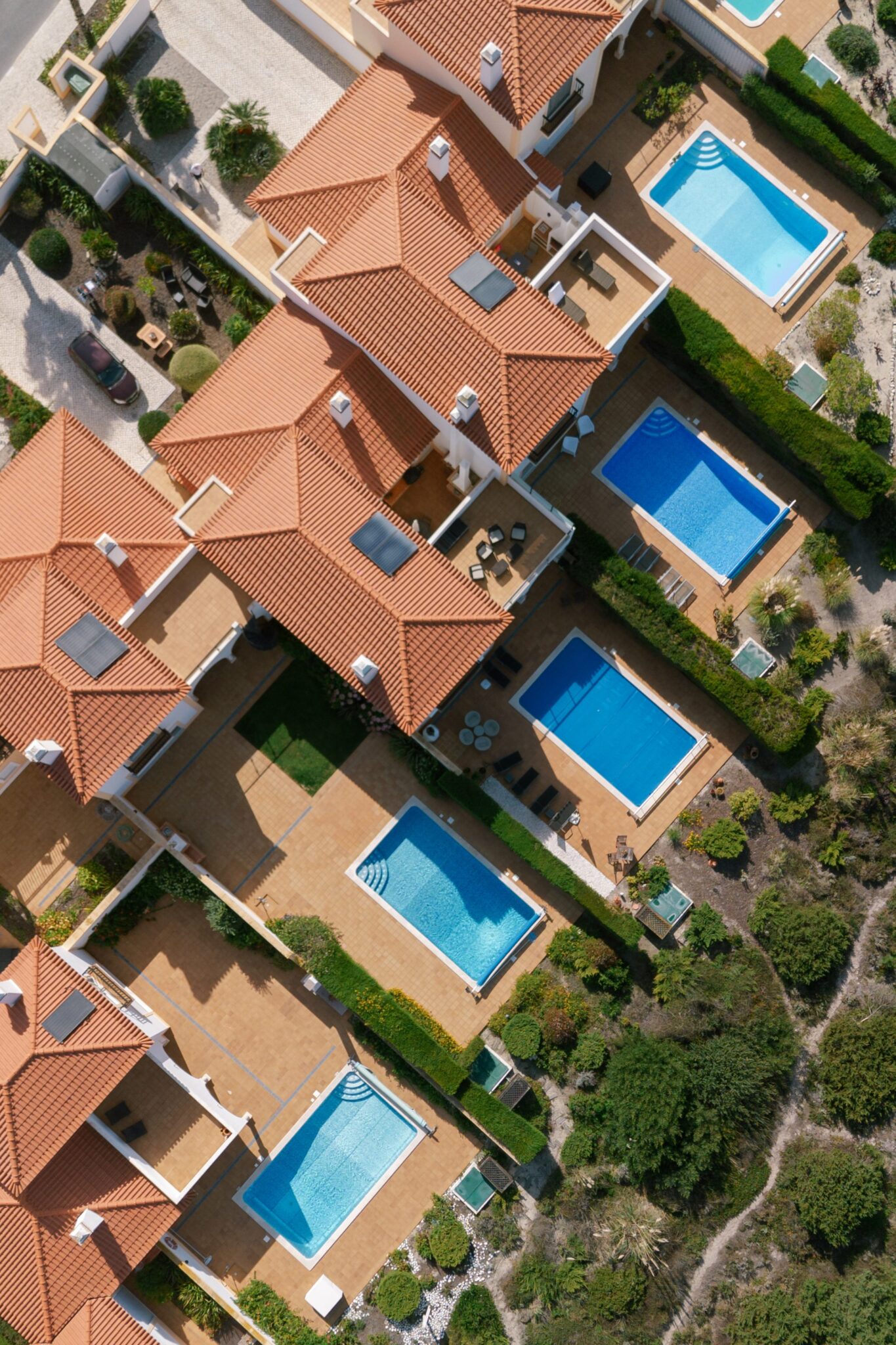Aerial view of luxury villas with private pools at Praia del Rey Portugal