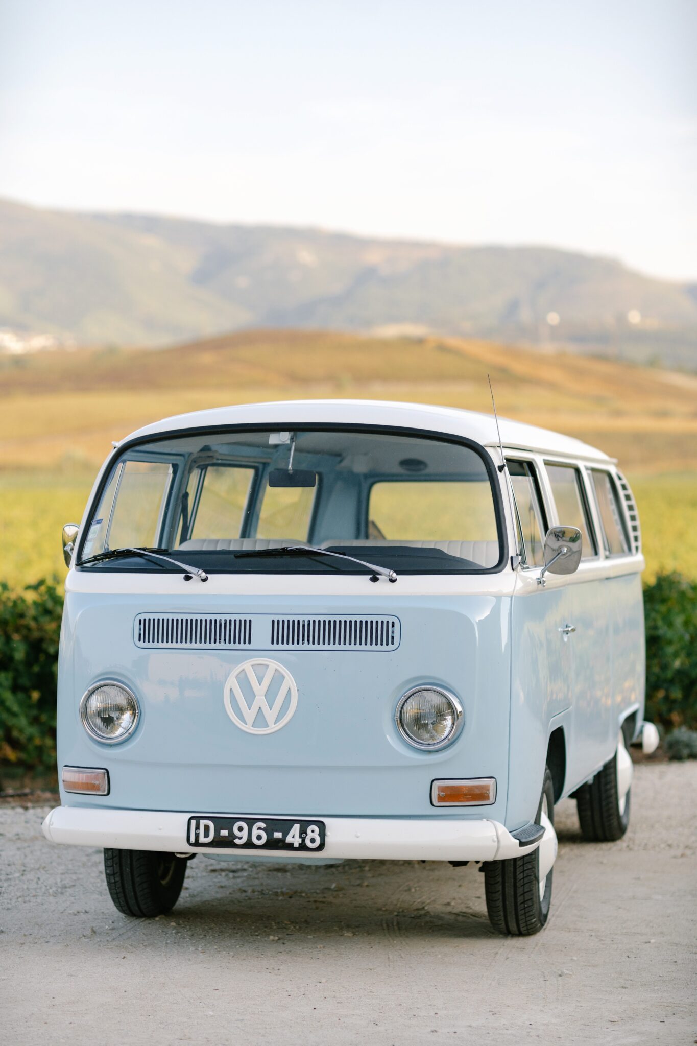 Vintage blue VW van parked at Quinta do Gradil vineyard in Portugal