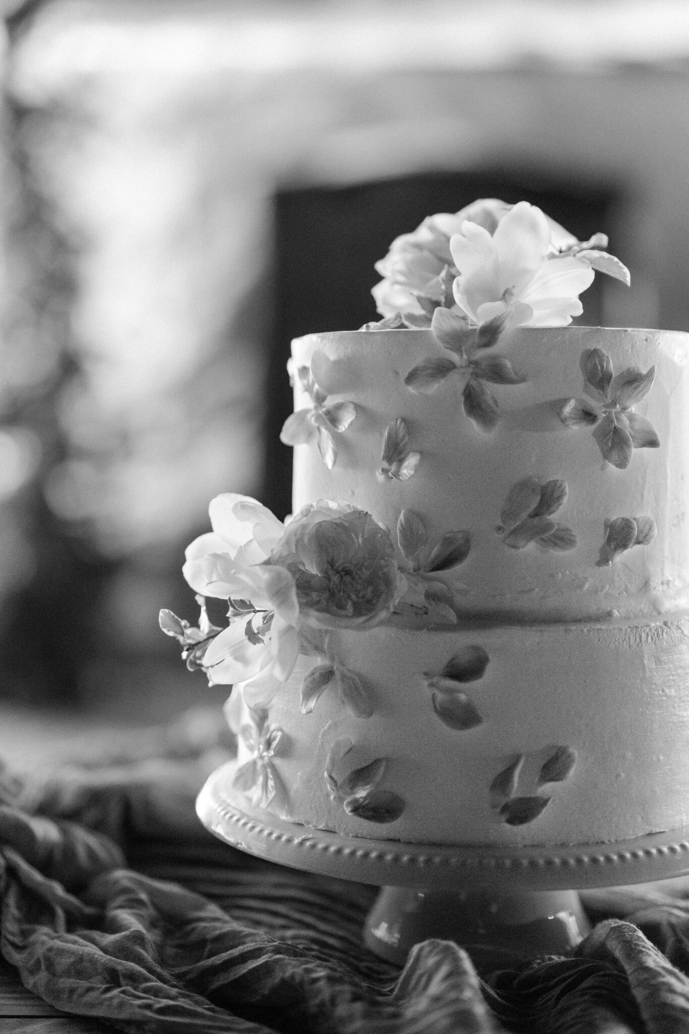 Black and white detail of elegant floral wedding cake in Portugal